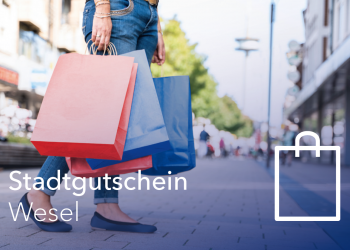 Gutscheinmotiv: Frau mit Einkaufstüten in der Weseler Innenstadt